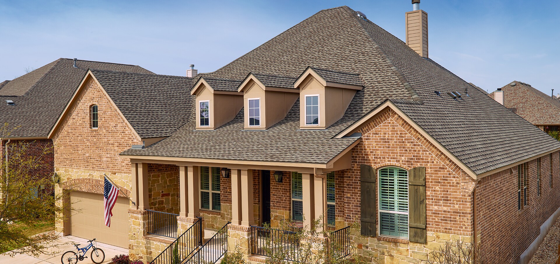 Home with gray Timberline HDZ roof shingles by GAF