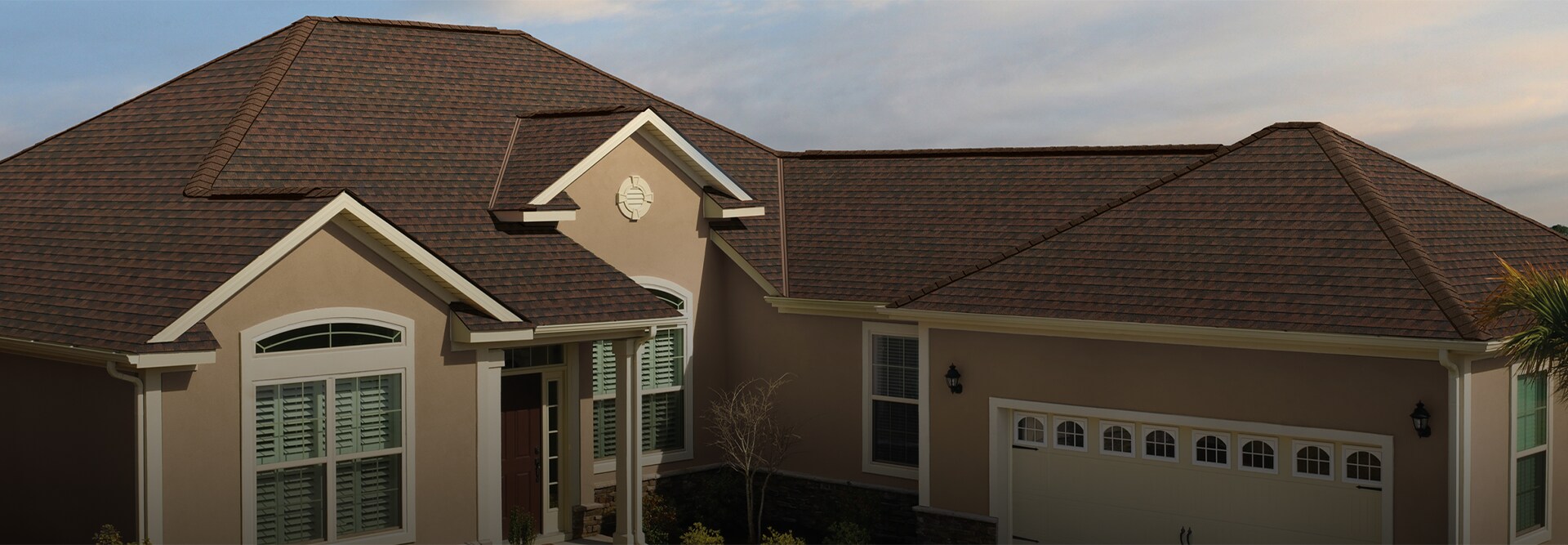 Aerial view of a house with GAF shingles installed on the roof