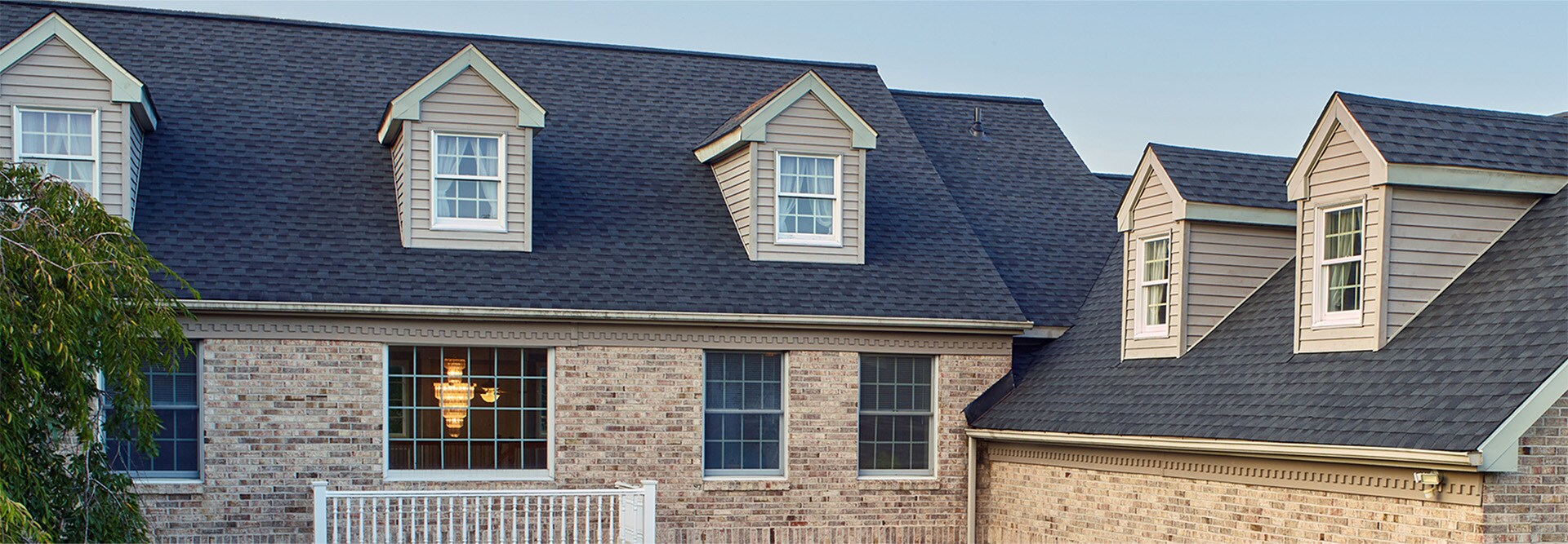 Residential home with GAF impact-resistant roof shingles